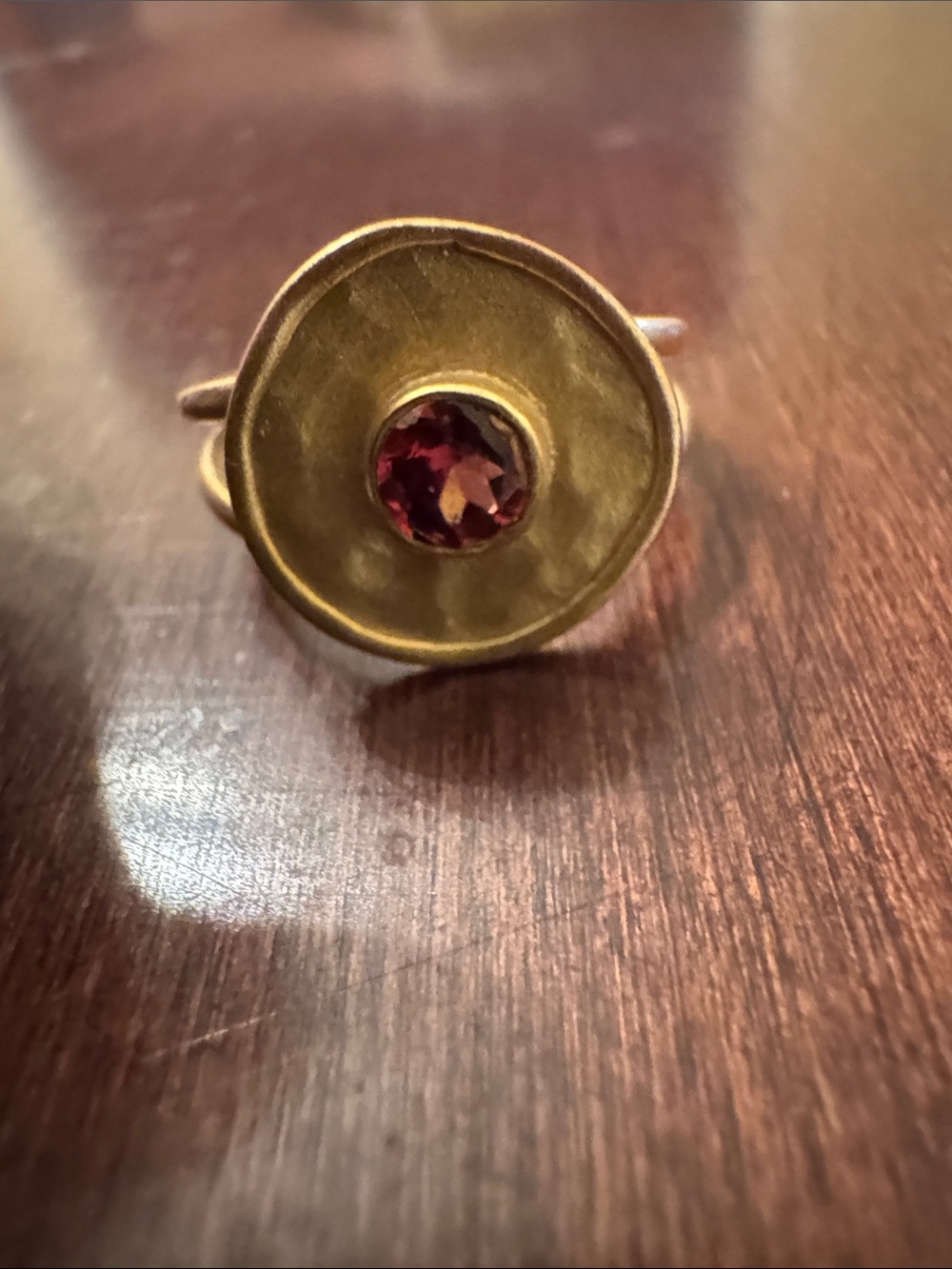 Gold Tone Ring with Deep Red Center Stone by